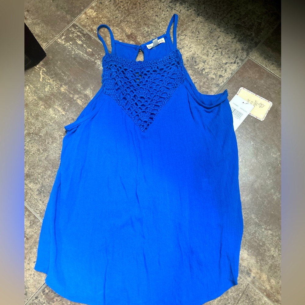 New beautiful blue woman’s shirt